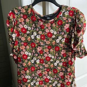 A Love Story floral blouse.